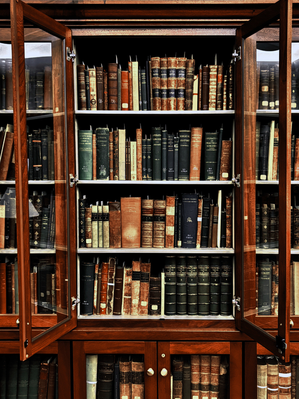 Photograph of the south rare book room, Orr collection, one shelf of books 